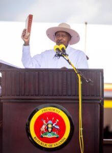 Faure Gnassingbé and Yoweri Museveni shaking hands at the inauguration ceremony