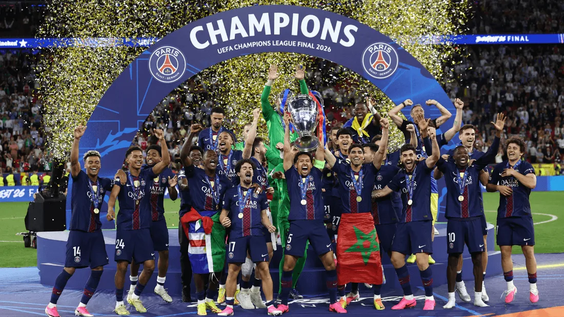 Paris Saint-Germain players lift the Champions League trophy for the second straight year.