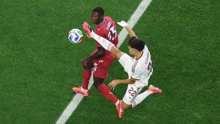 Portuguese defender Nuno Mendes in a duel with a Spanish player during the July 6, 2026 World Cup Round of 16 match in Dallas