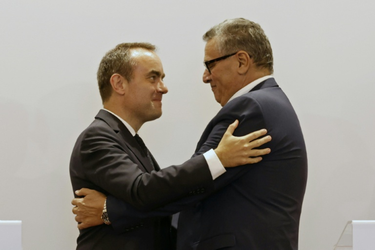 French Prime Minister Sébastien Lecornu (left) and Morocco's Prime Minister Aziz Akhannouch embrace after a joint press statement in Rabat