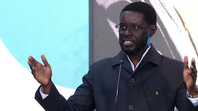 Diomaye Faye speaking at a podium