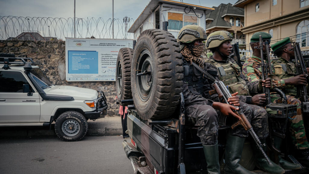 M23 rebels patrol near the Rodolphe Mérieux laboratory at Goma's National Institute of Biomedical Research on May 19, 2026.