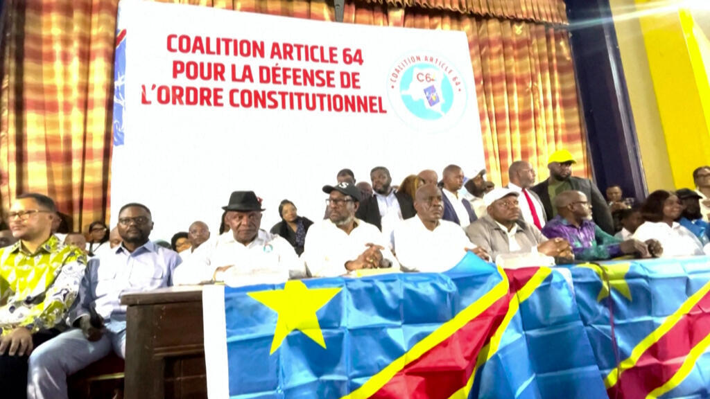 Opposition leaders from the C64 coalition stand on a podium in Kinshasa, Democratic Republic of Congo.